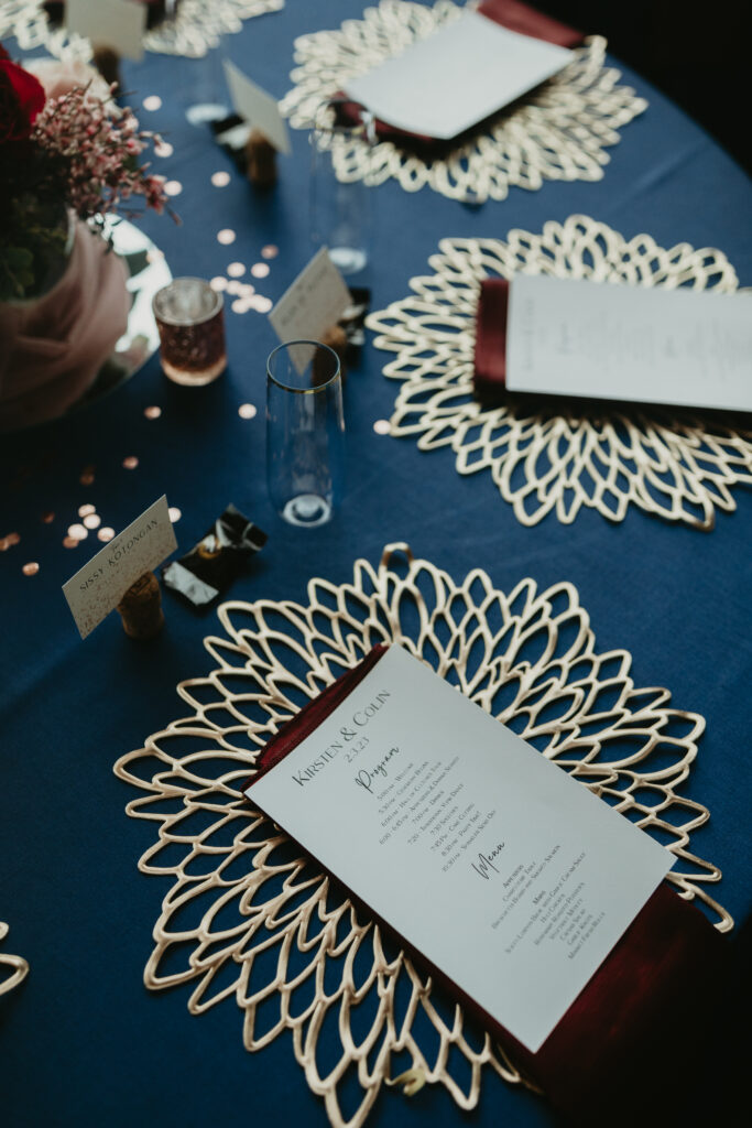 wedding table design navy burgundy and rose gold