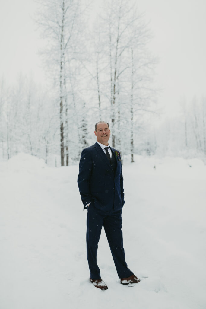 winter groom portraits, winter wedding in alaska, winter groom