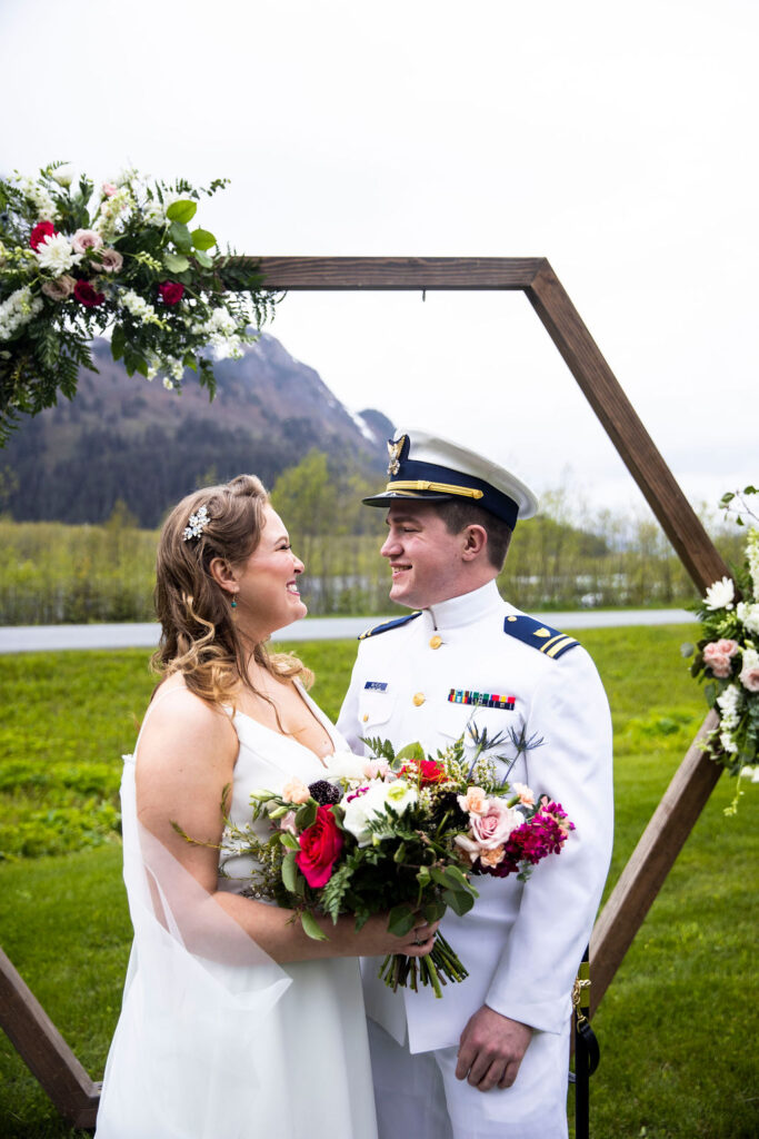 Bride and Groom in front of Arbor Military Wedding