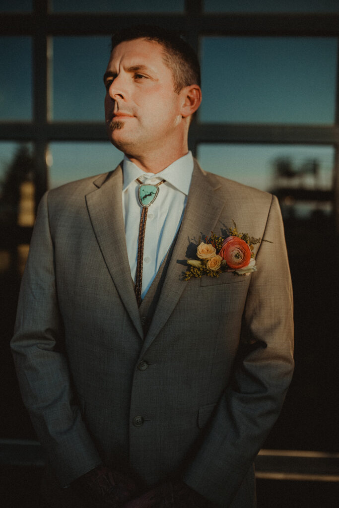 groom with turquoise bolo tie 